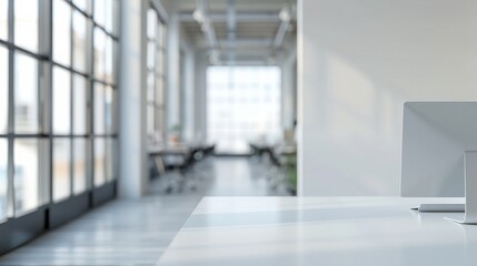 Obraz premium The blurred focus of a white, open-space office interior serves as a versatile backdrop, allowing for a clean and minimalist aesthetic. This setting provides a sense of spaciousness