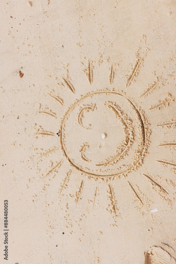 Poster Smiley face drawn in sand on beach with sun and waves in background