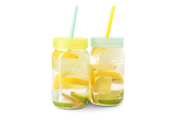 Mason jars of tasty lemonade with lime and ginger on white background