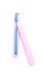 Blue toothbrush in case on white background