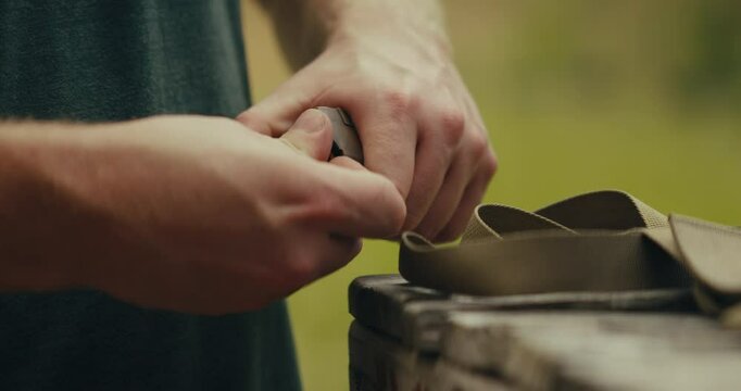 9mm bullets being grabbed and loaded into a magazine