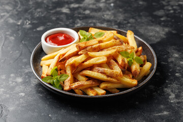 Homemade French fries with ketchup, homemade roasted in the air fryer.