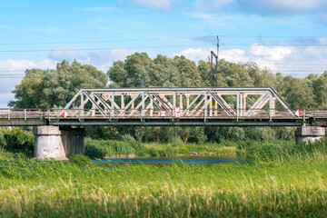 Obraz premium bridge over the river in the countryside