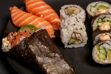 Sushi collection, isolated on black background, medium sushi set on black background, Sushi on a black background