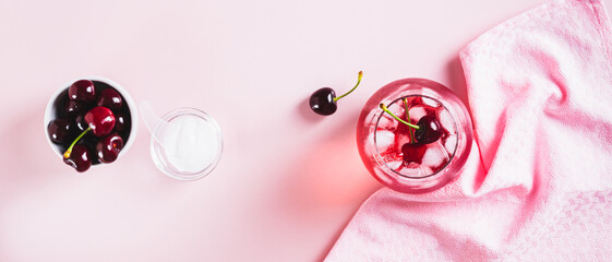 Sleepy girl mocktail with magnesium and cherry juice in a glass on the table top view web banner