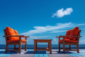 Cozy outdoor seating area by the water with wicker chairs.