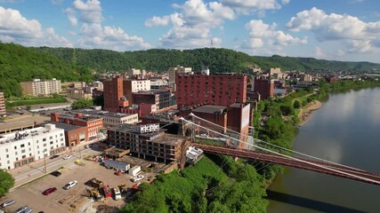 WEST VIRGINIA - 6.24.2024 - Great aerial footage rising above Wheeling, West Virginia on the Monongahela River.