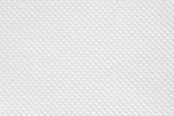A sheet of clean tiled white tissue paper as background