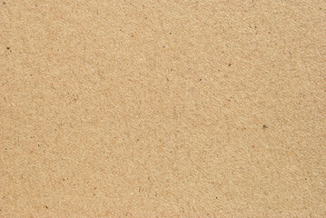 A sheet of brown recycled cardboard texture as background