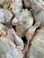 Fresh and raw chicken, meticulously cleaned and prepared specifically for broasting. This prime...