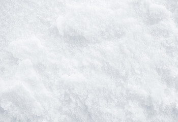 Naklejka premium Background of fresh snow texture. Snowy white texture.