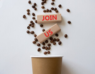 Join us symbol. Concept word Join us on wooden blocks. Beautiful white background with coffee cup. Business and Join us concept. Copy space