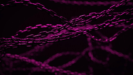 Intertwined metal chains are illuminated in a dark space by purple lighting. The chains create a network of shadows and lines.