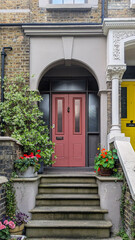 Dusty pink Gregorian classic door in house. London, UK