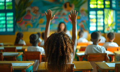 A black girl with curly hair is raising her hand during the class in a school in cartagena colombia