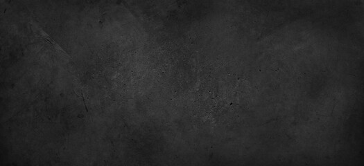 Dark grey textured concrete wall background