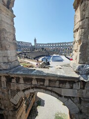 Pula Arena - The Pula Arena is a Roman amphitheatre located in Pula, Croatia. It is the only remaining Roman amphitheatre to have four side towers entirely preserved.