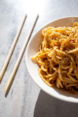 noodles with mushrooms and soy sauce close-up