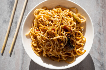 noodles with mushrooms and soy sauce close-up
