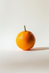 Fresh Clementine levitating on a white background