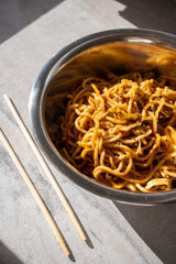 noodles with mushrooms and soy sauce close-up