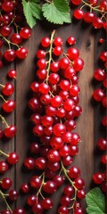 Fresh red currant on wooden table background. Top view