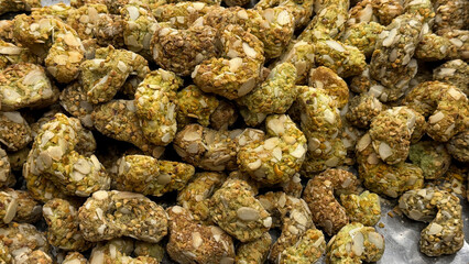 Close up of almond paste cookies, product of the Italian pastry