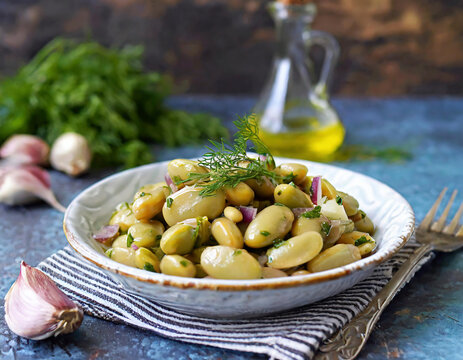 Traditional Turkish food; Fresh broad bean salad with olive oil, broad beans, onion and dill (Turkish name; i&ccedil; bakla) Mediterranean style fava beans.	