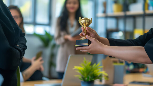 A manager handing out awards for top performers, proud and respectful, left third copy space