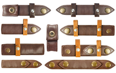 Isolated png photo of brown colored leather straps with holders and brass rivets or buttons on...
