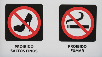 No smoking and high heels signs, danger of falling. With coat of arms of the Locality of Mafra