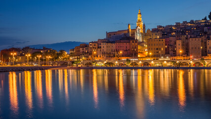 Illuminated promenade and downtown of Menton at twilight  - Cote D'Azur, France