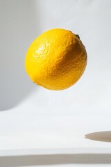 Fresh Yuzu levitating on a white background