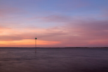 Moody sunset over the Thames Estuary Essex, England, United Kingdom