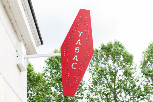 Enseigne carotte de buraliste