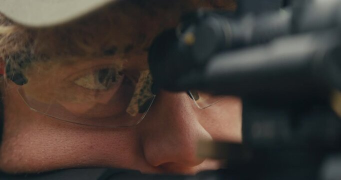 Young man shooting an AR-15