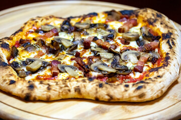 Rustic artisan mushroom pizza with bacon