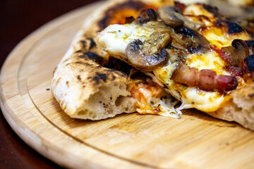 Rustic artisan mushroom pizza with bacon