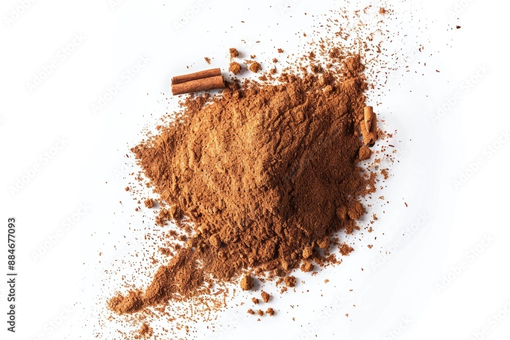 Poster a photo of a pile of cinnamon powder and cinnamon sticks, ideal for use in recipes or as a decorativ