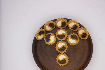 Patterned Cookies on Dark Round Plate