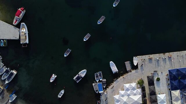 Aerial Revealing Rotating Top View over Syvota Marina, Limenas Mourtos Bay, Greece