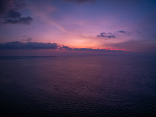 Landscape Aerial view of majestic clouds in the sky sunset or sunrise over sea with reflection in the tropical sea.Beautiful landscape scenery.Amazing light of nature Landscape nature background