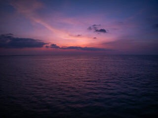 Landscape Aerial view of majestic clouds in the sky sunset or sunrise over sea with reflection in the tropical sea.Beautiful landscape scenery.Amazing light of nature Landscape nature background