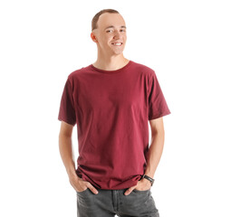Obraz premium Handsome young man in stylish t-shirt isolated on white background