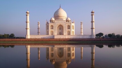 Fototapeta premium Stunning Taj Mahal at dawn, reflected in the Yamuna River, intricate marble details, peaceful atmosphere, historic Indian icon, warm hues