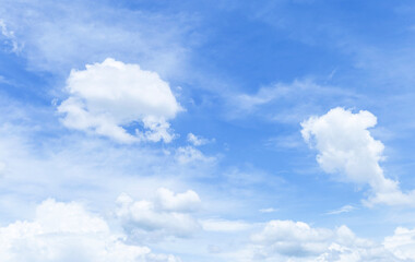 White fluffy cloud over blue sky, nature background, season and weather concept