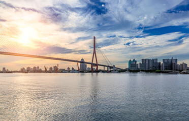 Bridge buildings and river in modern city of Shanghai