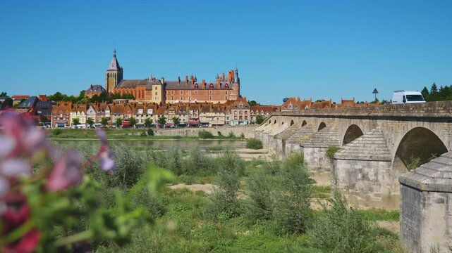 View of Gien with the castle and the old bridge across the Loire river, France. High quality 4k footage