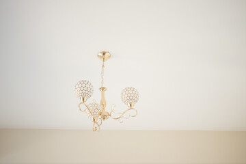 colorful ceiling lamp hanging in a room ,