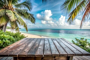 Scenic tropical beach view from a wooden picnic table with palm trees, clear blue water, and a vibrant sky - perfect for a summer getaway.